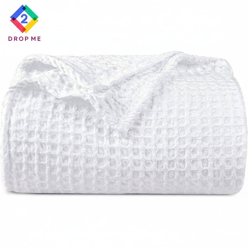 Lightweight pre-washed waffle weave blanket in ivory, durable and elegant bedding accessory.