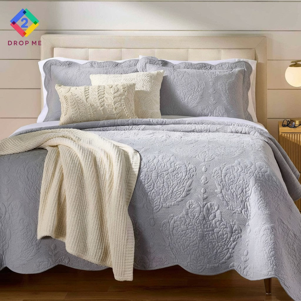 Light gray paisley embroidered quilt on full/queen bed – elegant and soft bedding from Better Homes & Gardens 🩶