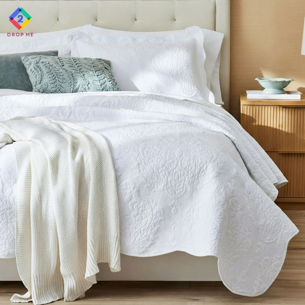 White paisley cotton quilt styled on bed with accent pillows and blanket – cozy minimalist bedroom décor 🤍✨"