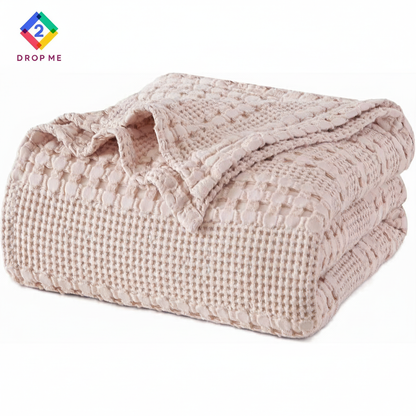 Cozy waffle texture blanket in ivory color, breathable and stylish throw for bed or sofa.